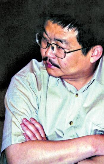 唐万新（德隆国际投资控股有限责任公司总裁）